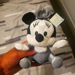 NWT Minnie mouse plush toy.